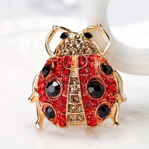 Elegant Ladybug Brooch with Red and Gold Accents